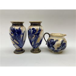 A collection of Doulton Burslem Iris pattern wares, comprising pair of baluster form vases, 19cm, jug, H11.5cm, and two plates, D24cm.  