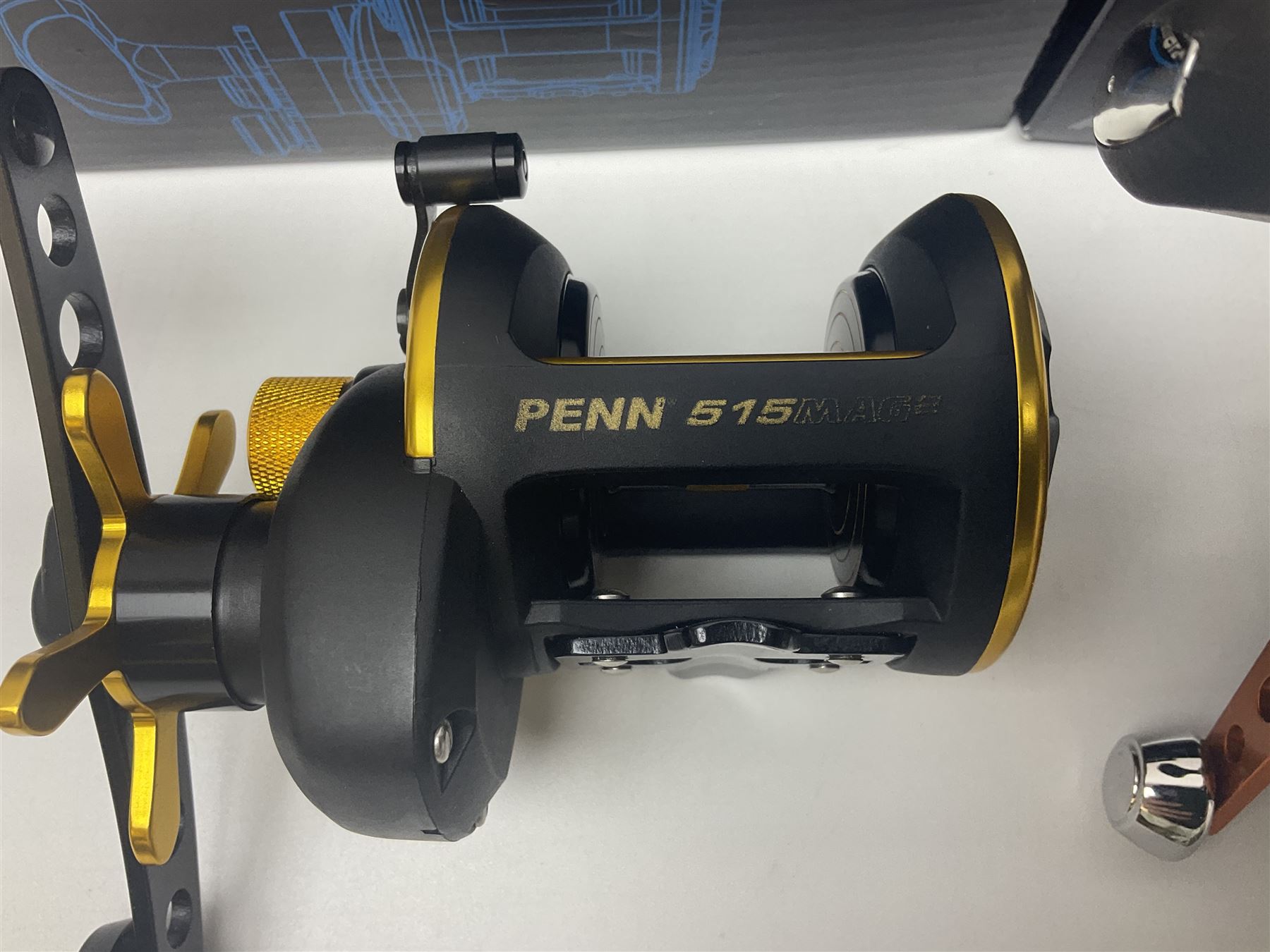 Three multiplier spool sea fishing reels, to include Swedish Abu Ambassaduer 700c Black, with spare spool, Swedish Abu Garcia Ambassadeur 6500 C3 CT MAG and Penn 515 MAG2, all boxed