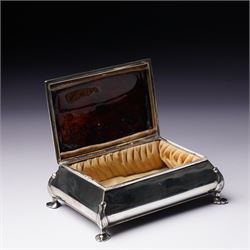 Edwardian silver rectangular trinket box with padded interior, the hinged cover inset with a tortoiseshell panel with pique decoration and on shaped supports W12cm Birmingham 1910 Maker Henry Matthews