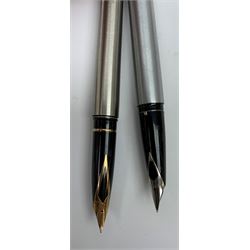 A Sheaffer Triumph Imperial fountain pen, with brushed chrome body, together with another similar brushed chrome example, with nib marked 585 14K, in maker's box. (2). 