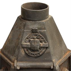 C Portways & Son (Halstead, Essex) - 19th century Slow But Sure Patent cast iron tortoise stove with five iron holders and irons