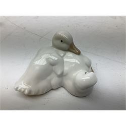 Pair of Royal Doulton/Beswick spaniels, with printed and impressed marks together with pair of Nao ducks and a ceramic figure of a hare
