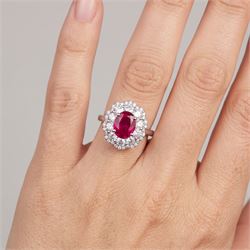 18ct white gold unheated oval ruby and round brilliant cut diamond cluster ring, hallmarked, ruby 3.07 carat, total diamond weight approx 1.65 carat, with WGI certificate
