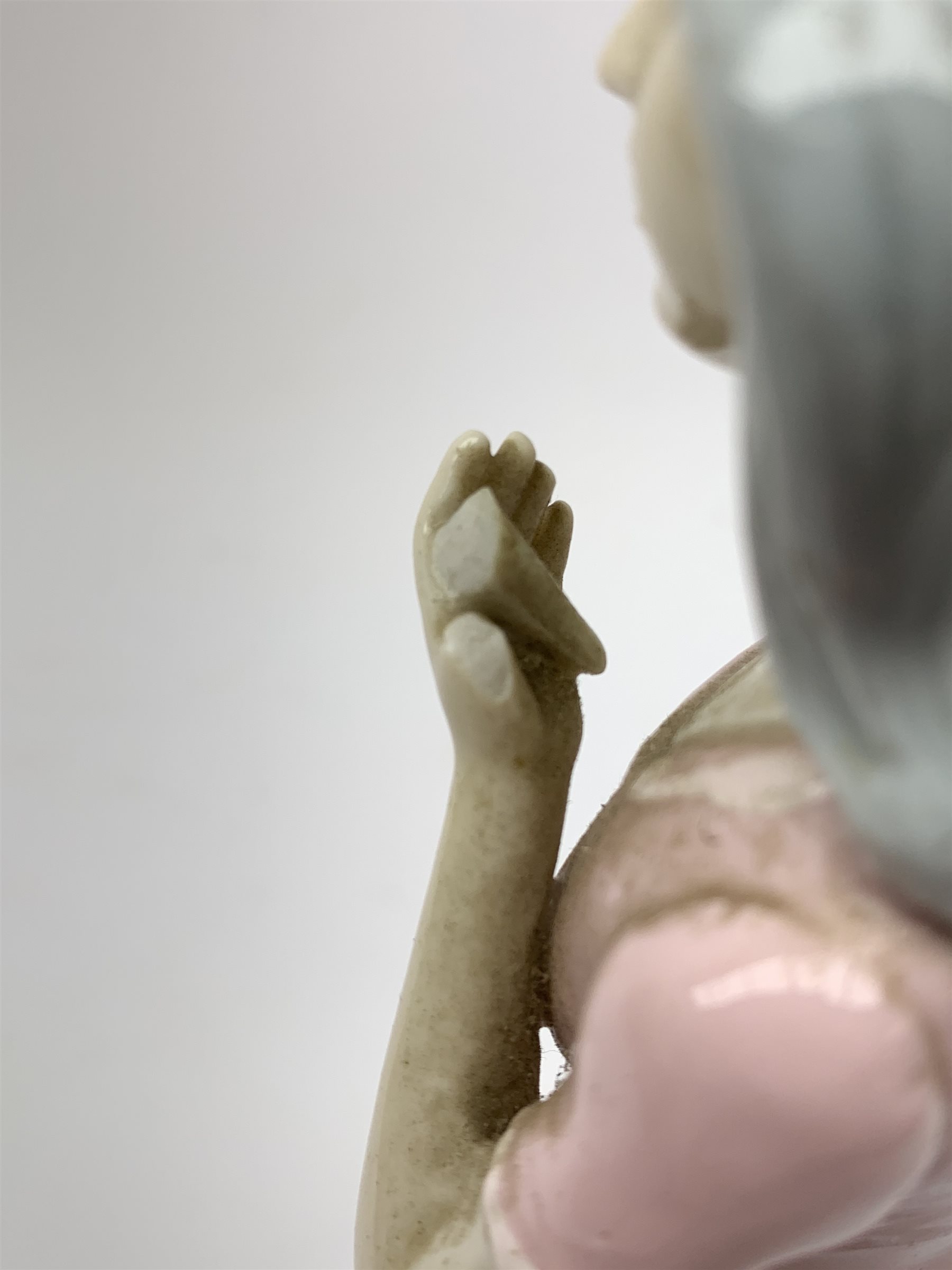 An Art Deco style bronze after D Alonzo, modelled as a female hoop dancer, with impressed mark and foundry mark, raised upon a cylindrical marble base, overall H47cm. 