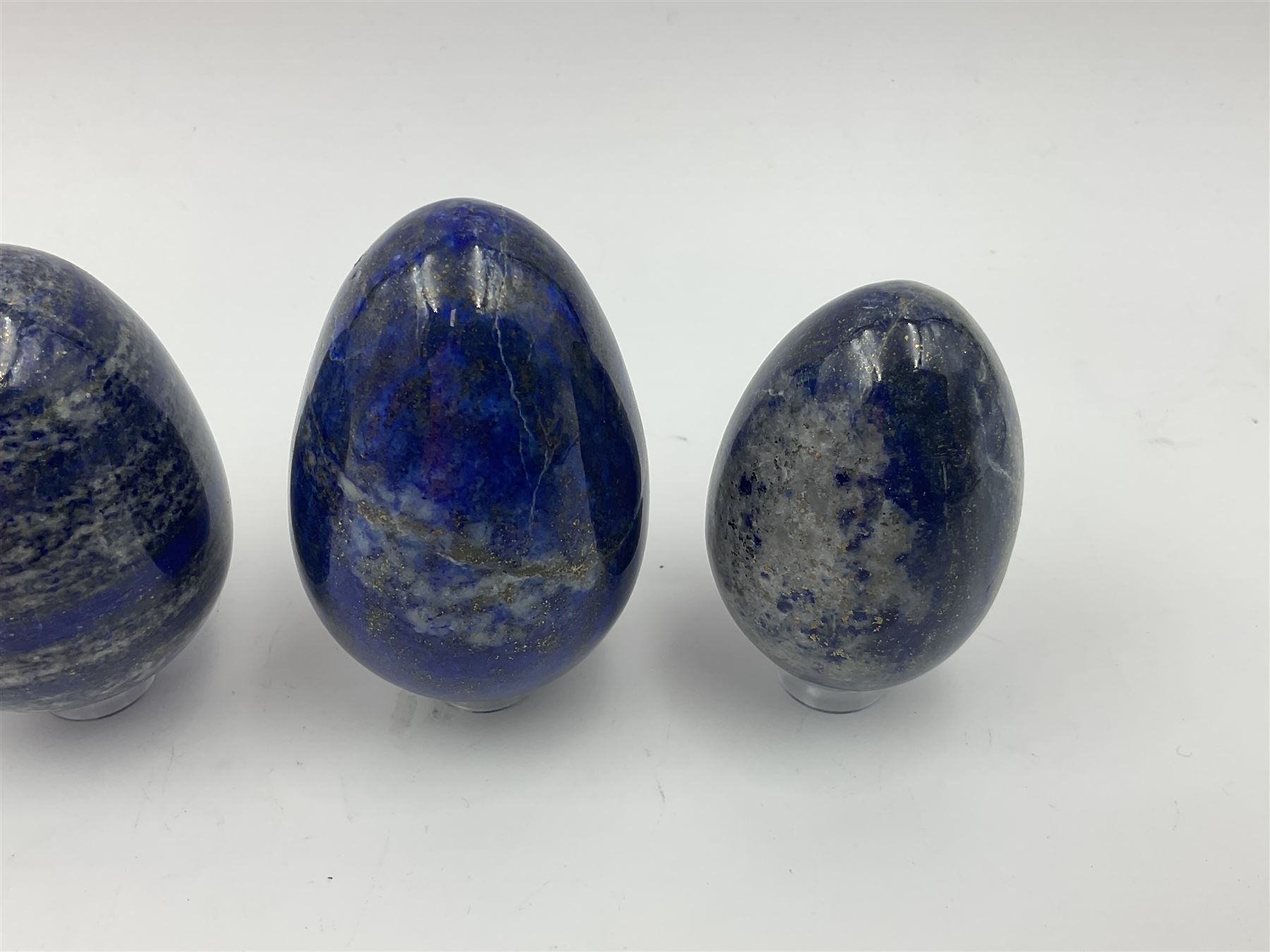 Collection of five Lapis lazuli specimen eggs, largest egg H7cm