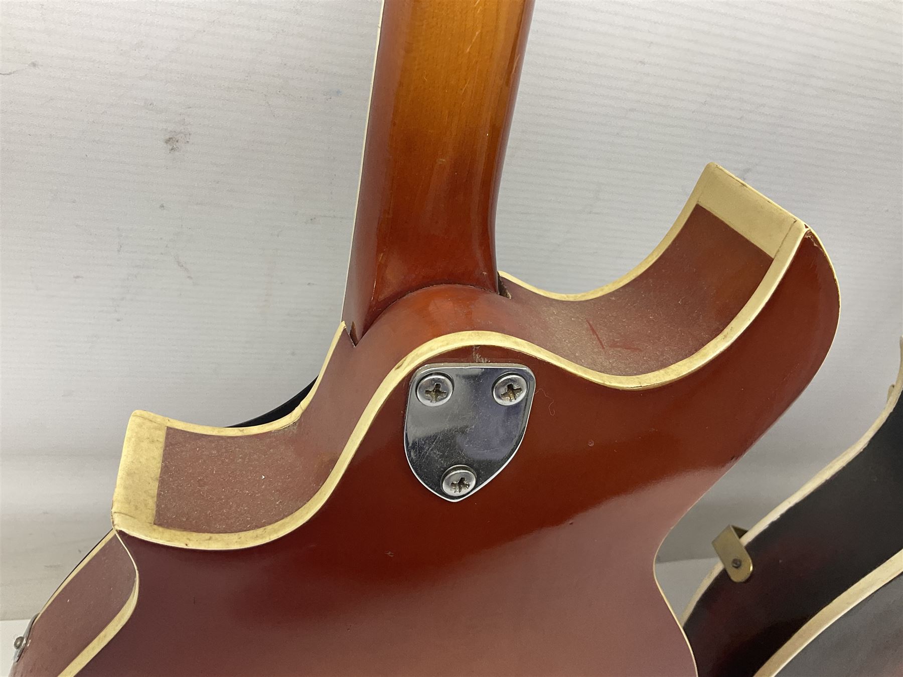 Eastern eight-string mandolin with sunburst finish and mother-of-pearl inlay L68.5cm; and another Harmony mandolin with cracked headstock (2)