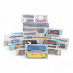 N gauge model railway rolling stock, predominantly Atlas examples, including Atlas no. 38804 Double Door Box Car, Atlas no/. 32791 90 Ton Hopper and Micro Trains Steel Side 14 Panel Fixed End Gondola with Rock Load, mostly in original boxes