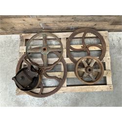 Various cast iron implement wheels
