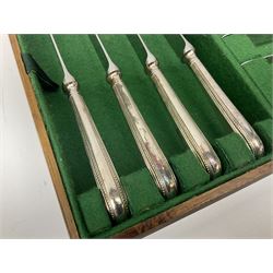 Oak cased canteen of cutlery, six covers, plus, contained within a hinged canteen with lift out tray, L43cm