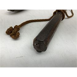 Tribal Art - an African axe, possibly Yoruba, the bone shaft carved as two cord bound stylised figures with iron fan-shaped blade, L35cm overall; and 19th century harpoon or spear head of square section with two long fixing arms on cut-down ash shaft L57cm (2)