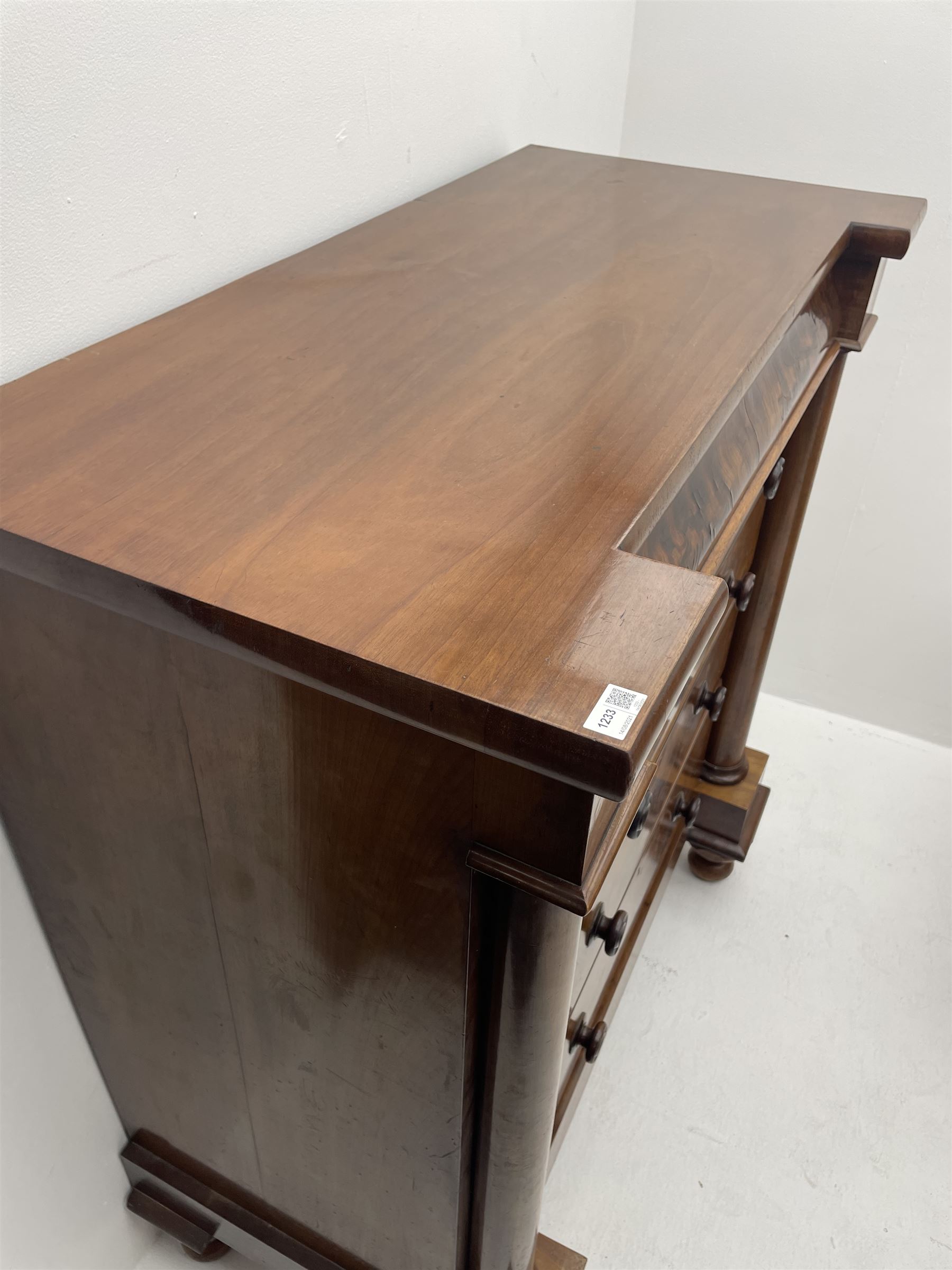 Victorian mahogany chest, frieze drawer over two short and three long drawers, turned column