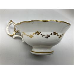 19th century teacup and saucer, possibly H R Daniel, together with a further teacup and saucer in the manner of Minton with butterfly handle, (2)