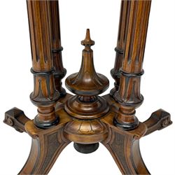 Victorian inlaid walnut card table, figured quarter veneered rectangular top with ebonised moulded edge, decorated with scrolled foliate satinwood inlays and stringing, swivel and fold-over action revealing baize lined interior, quadruple turned, fluted and foliage carved pillar supports enclosing central finial, four extending splayed supports on brass and ceramic castors, faceted feet terminals with ebonised detail