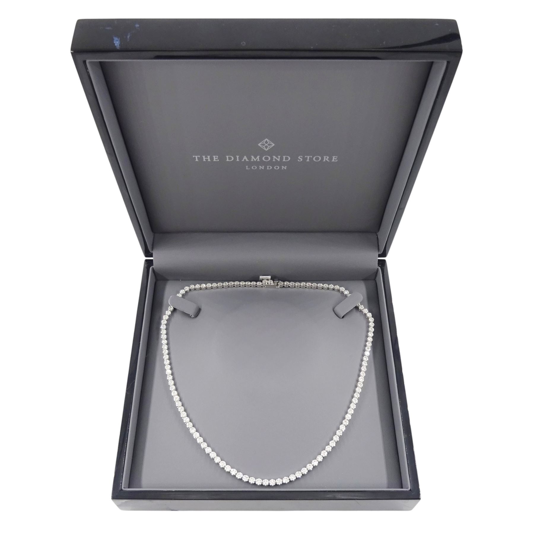 18ct gold diamond necklace, one hundred fourteen clusters, each set with seven round brilliant cut diamonds, hallmarked, total diamond weight 5.00 carat, boxed with certificate