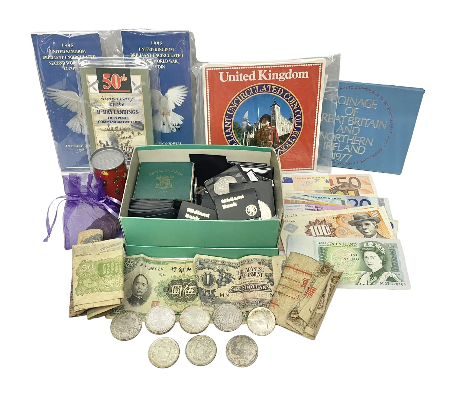Great British and World coins and banknotes, including United Kingdom 1985 brilliant uncirculated coin collection, two 1995 brilliant uncirculated two pound coins in card folders, commemorative crowns, King George VI 1951 Festival of Britain crowns in card cases, United States of America 1964 Kennedy half dollar, two Switzerland 1966 five franc coins, five German 1972 commemorative coins, Euro banknotes, Bank of England Somerset one pound 'DU27', Japanese banknotes etc