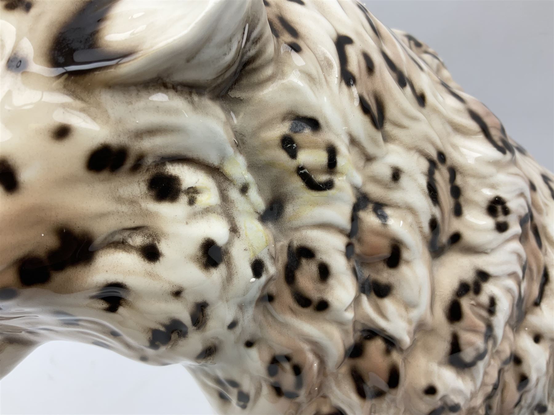 Ronzan fireside model of a snow leopard, with printed mark beneath, H38cm 