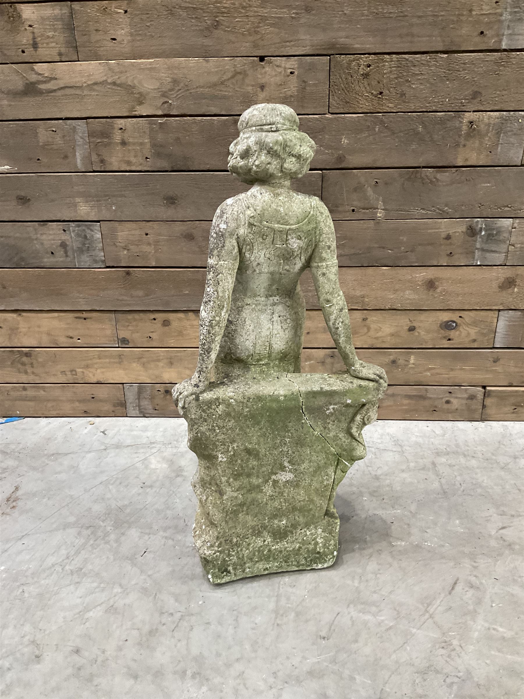 Pair of cast stone garden dogs and 2 female figures,