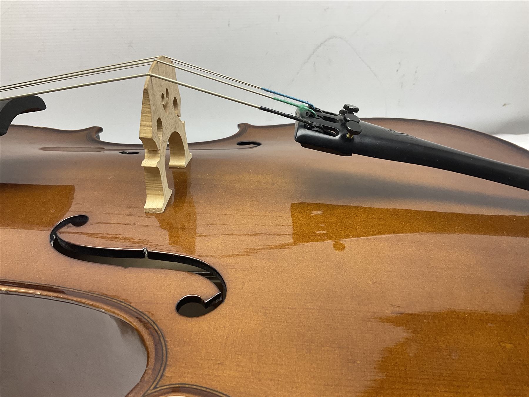 Stentor Student I quarter-size cello with 59.5cm two-piece maple back and ribs and spruce top; bears maker's label with serial no.M072648 L95.5cm overall; in Stentor soft carrying case with bow