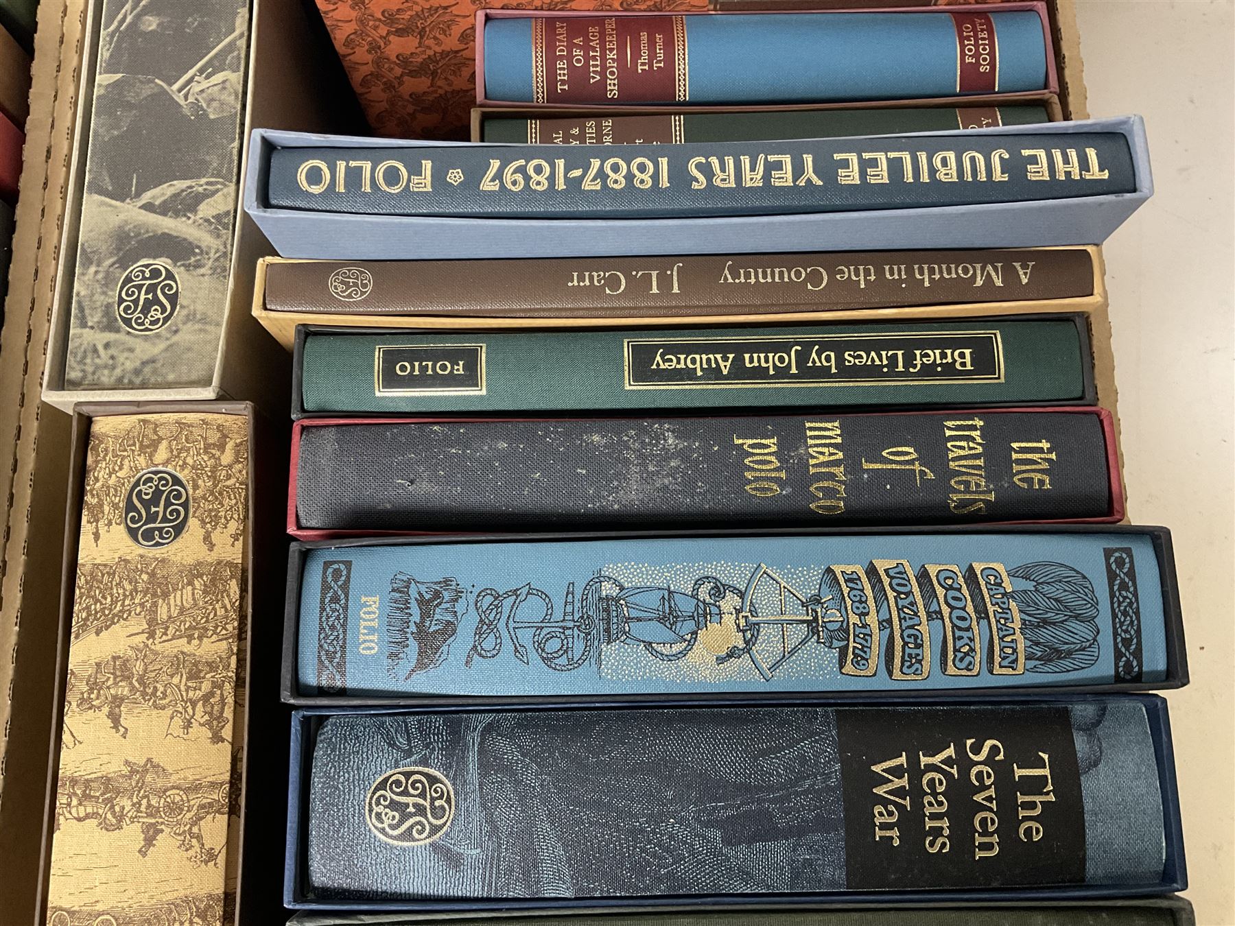 Folio Society; twenty eight volumes, including The Seven Year War, The Boer War, The Ottoman Empire, The Moons a Balloon, Captain Cooks Voyages etc 