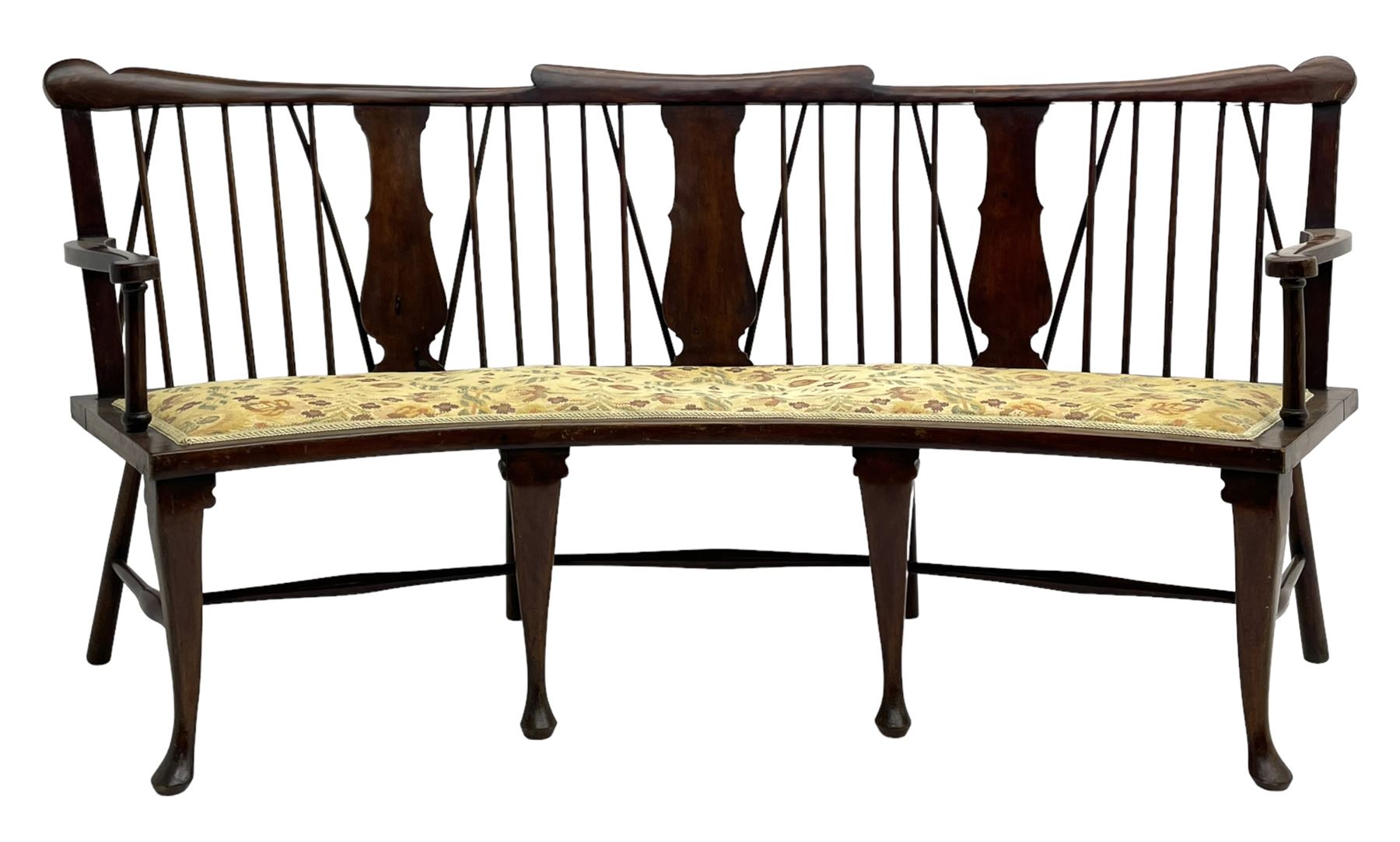 Georgian design curved Windsor settee or settle, shaped cresting rail over triple vase shaped splats and stick back, upholstered seat, on cabriole front supports joined by a series of swell turned stretchers