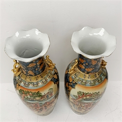 A pair of Chinese floor vases, of baluster form with frilled rim and twin gilt handles, decorated with figural scenes contained within foliate bands and stylised borders, H90cm. 