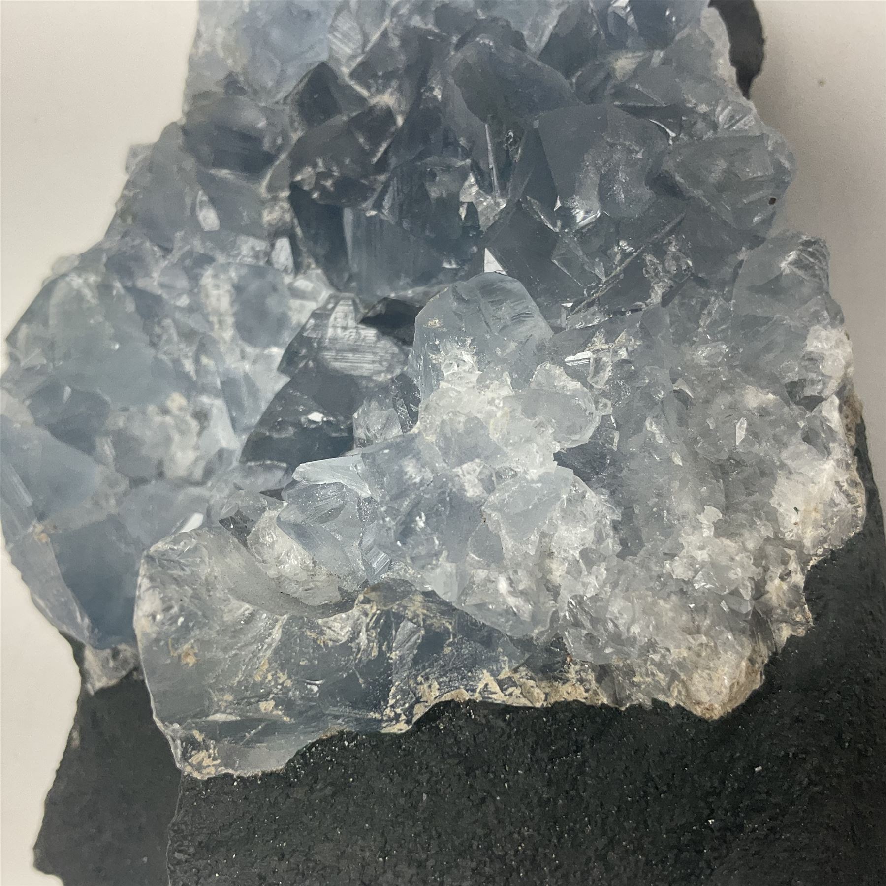 Celestine crystal geode cluster, with well-defined crystals of various sizes, H13cm 