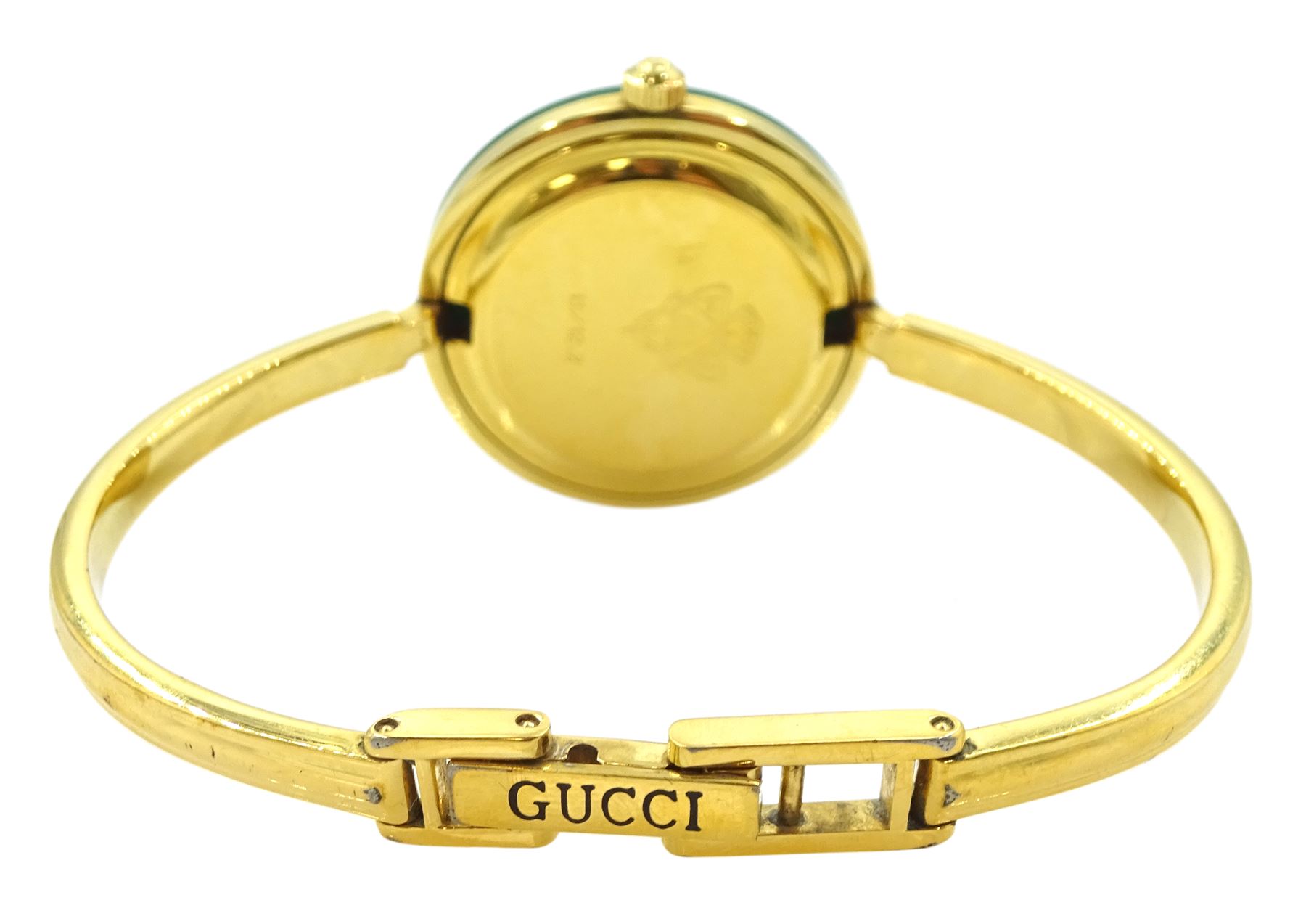 Gucci ladies gold-plated quartz wristwatch, Ref. 11/12.2, with eleven interchangeable coloured ring bezels, boxed with warranty card dated 1997 
