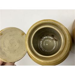 Large 2 gallon stoneware flagon, stamped 'John Soulby Wine Merchant Malton 2 Gall', together with a collection of similar stoneware jars and bottles, largest H40.5cm