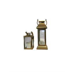 Pair of oil lamps, with impressed mark beneath Farms Lamp Light, together with another oil lamp and two lanterns  