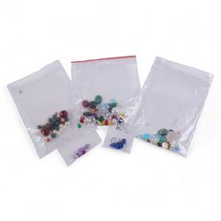 Large collection of loose gemstones, various sizes and cuts, including amethyst, cubic zir...