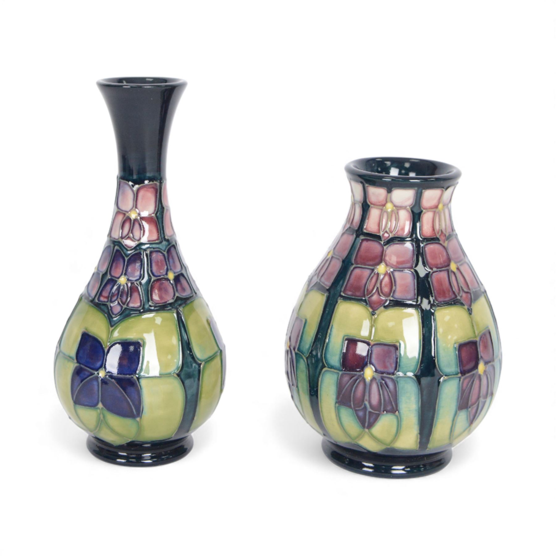 Two Moorcroft vases, in violets pattern, with original boxes, bud vase H17cm