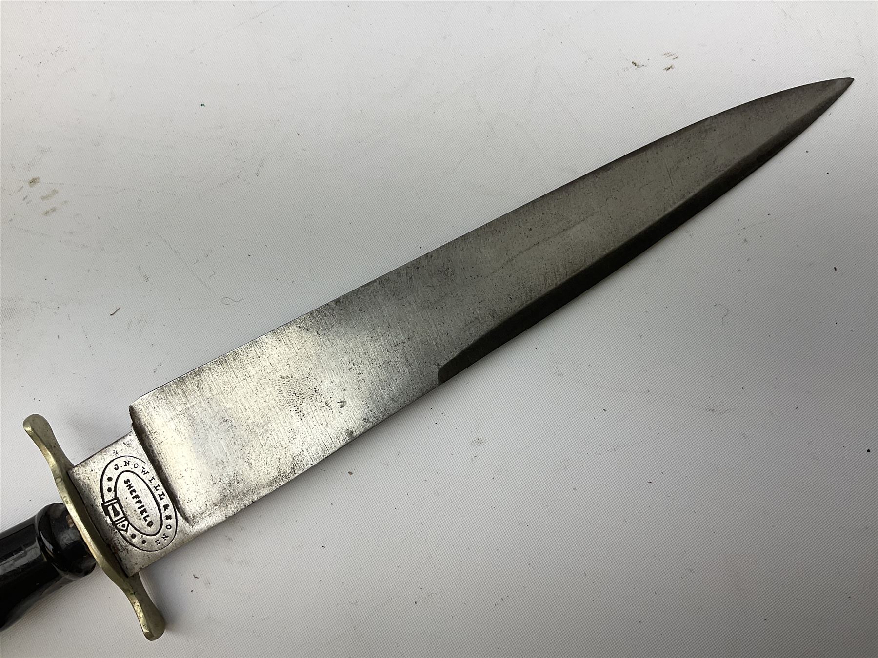 Hunting knife by J Nowill & Sons, Sheffield, the handle inset with mother of pearl, blade length 19cm; George Wolstenholme IXL lock-knife with antler scales L29cm open; and another Bowie style hunting knife marked 'V.R. Warranted Sheffield Joseph Ellis & Sons' in leather sheath (3)