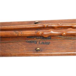Callow & Son - 19th century travelling coaching whip, the two part yew wood shaft, with silver collars and butt end, hallmarked U & T Walker, London, with leather handle, upon a Callow & Son mount, whip L166cm 