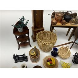 Collection of miniature dolls house furniture and accessories, to include long case clock, chest of drawers, tiled wash stand, ceramics and glass ware, mirror, baskets, etc 