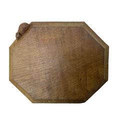Mouseman - adzed oak breadboard, canted rectangular form with moulded edge carved with mouse signature, by the workshop of Robert Thompson, Kilburn, W30.5cm D25cm