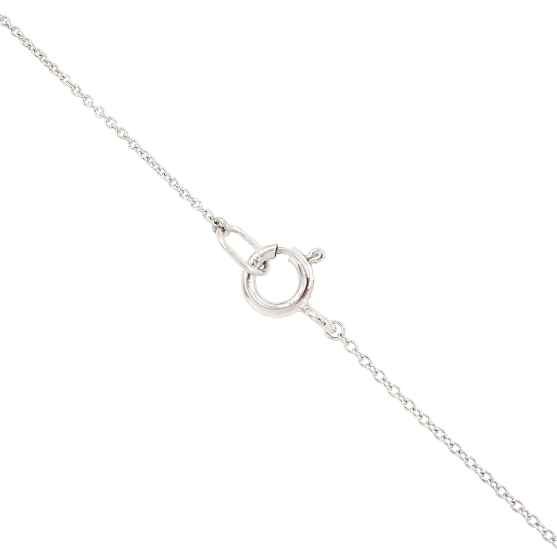 Platinum Colombian emerald and diamond pendant necklace, single octagonal cut emerald of 7.38 carat, surrounded by round cut diamonds in a fancy milgrain pierced design setting, stamped Pt 950, on a trace link chain necklace, total diamond weight 1.14 carat, with GCS certificate