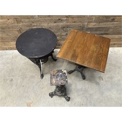 Cast iron Britannia circular pub table, and two pedestal cast iron bases (3)