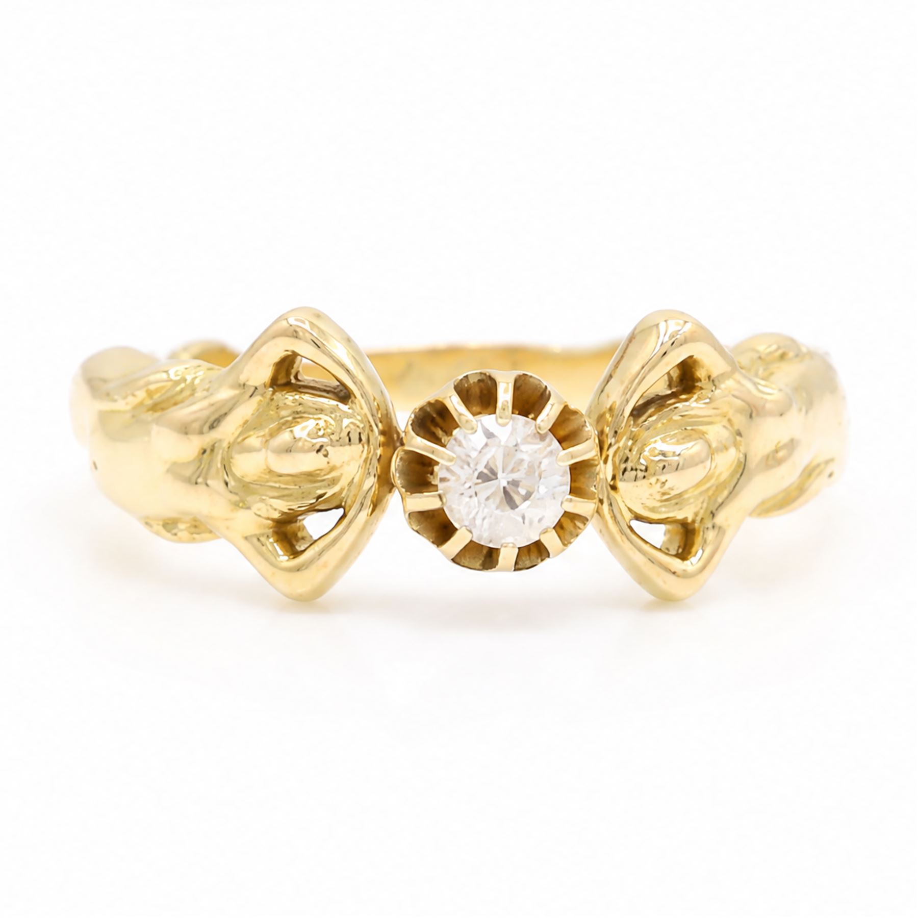 Gold diamond figural ring, single old cut diamond of approx 0.45 carat, with a nude female figure either side, stamped 18ct