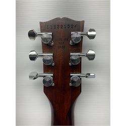2012 American Gibson Les Paul Studio electric guitar, retro fitted with iron gear pick-ups, push-pull 'pots', roller bridge, string butler and locking machines, serial no.115321594, L99cm overall; in Gibson soft carrying case.