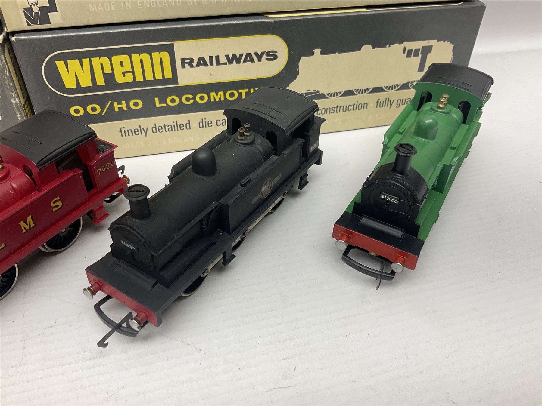 Wrenn '00' gauge - five Class R1 0-6-0 tank locomotives - No.7420 in LMS Red; No.31337 in BR Black; No.31340 in BR Malachite Green; No.1127 in Southern Green; all in boxes with instructions; and No.1127 in Southern Green; in associated Wrenn box (5)