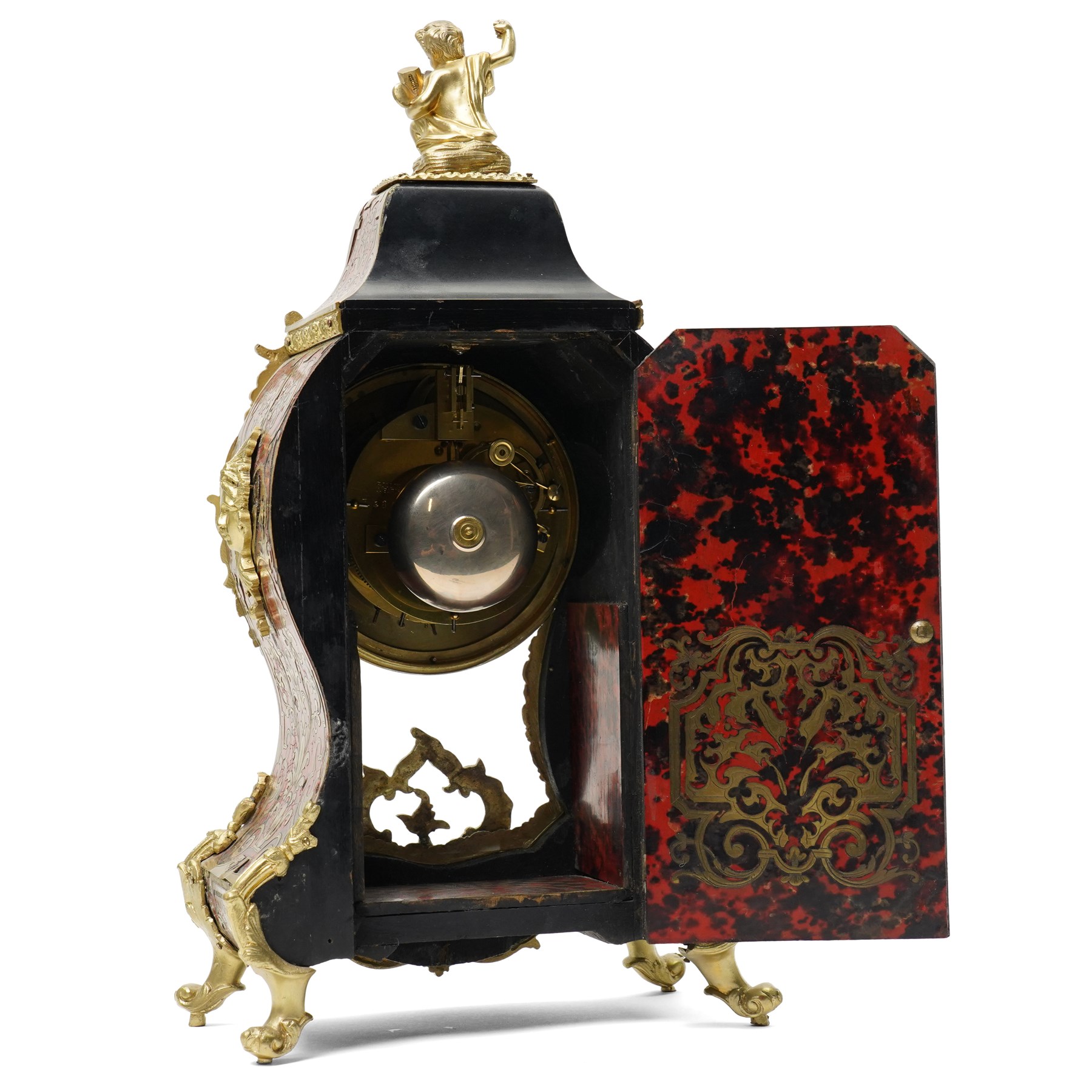 Rollin à Paris - 19th century French Louis XV style ormolu-mounted red tortoiseshell and brass Boulle-work mantel clock, surmounted by a seated musical putto above a waisted case applied with mask, rocaille, foliate and dolphin mounts, the gilt dial with white enamel Roman numeral cartouches, twin-train movement striking on a bell, signed and numbered 480, on four scrolling foliate feet