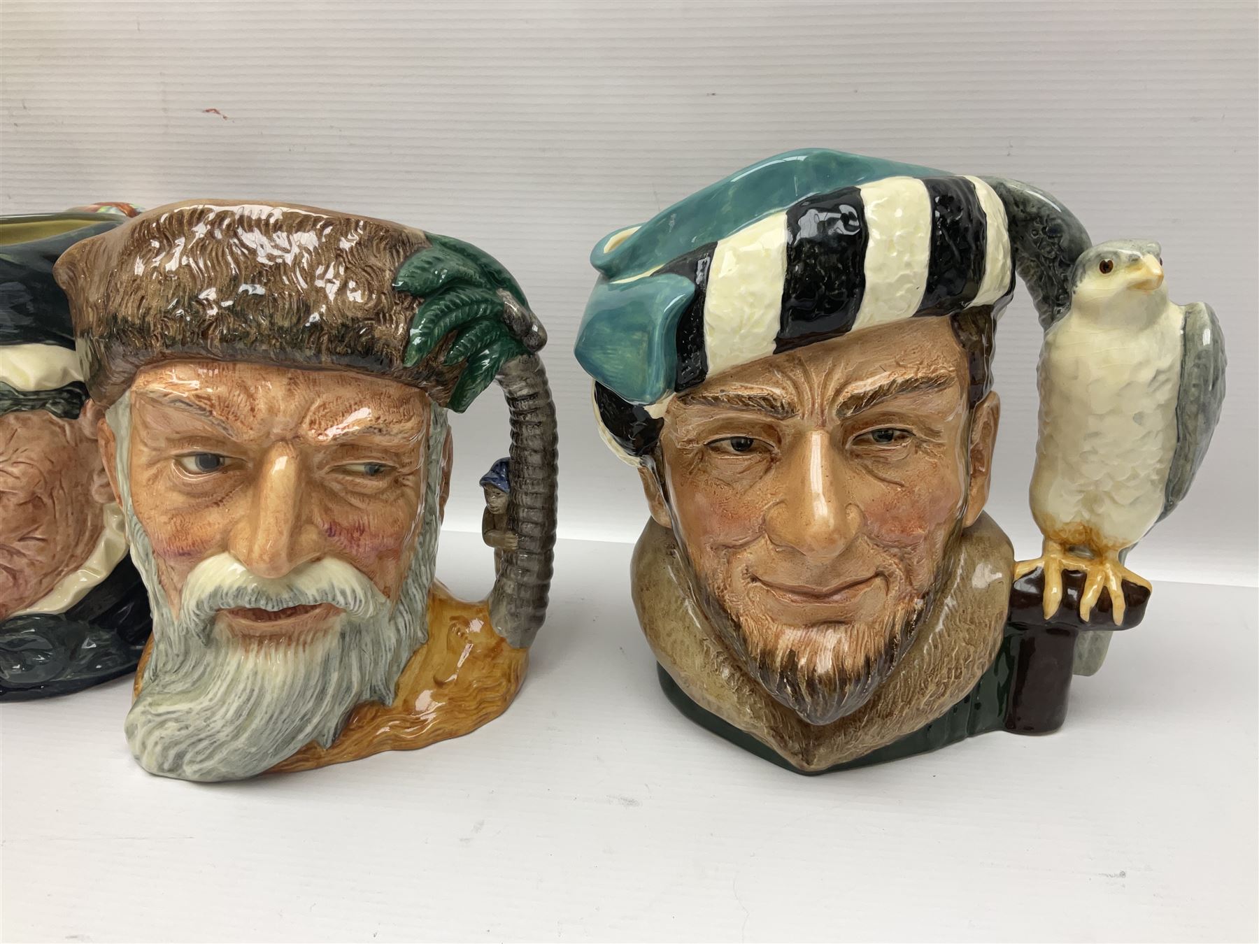 Large collection of Royal Doulton character jugs, to include Robinson Crusoe D6532, Tam O Shanter D6632, The Falconer D6533 etc, together with similar charater jugs and toby jugs   