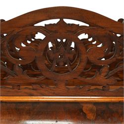  Victorian, walnut Canterbury- magazine rack with four fretwork upstands, drawer to base, standing on turned legs terminating in original castors. circa 1880
