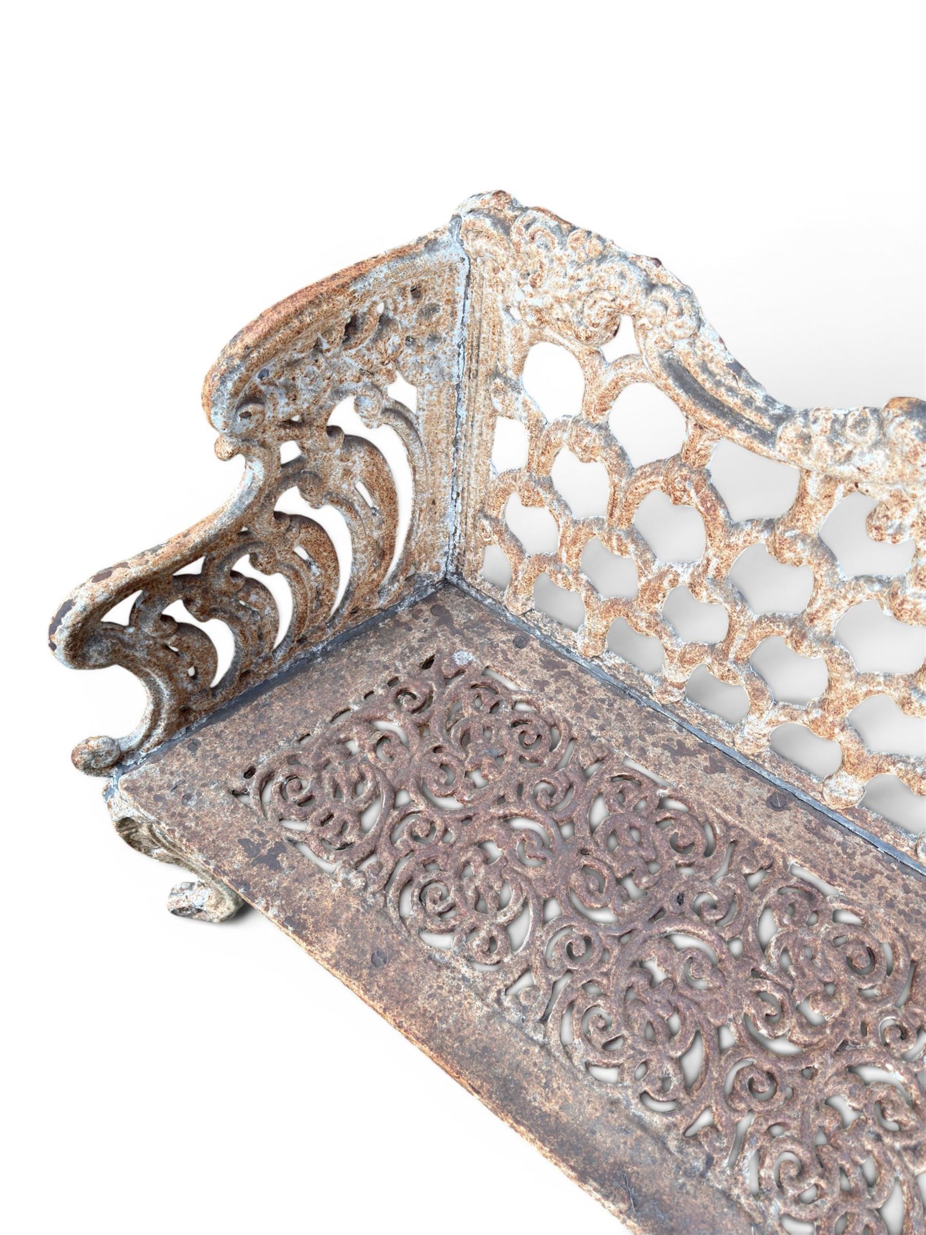 Victorian revival Carron Foundry design heavy cast iron two seat garden bench, scrolled arms with pierced lattice seat, finished in antique white paint