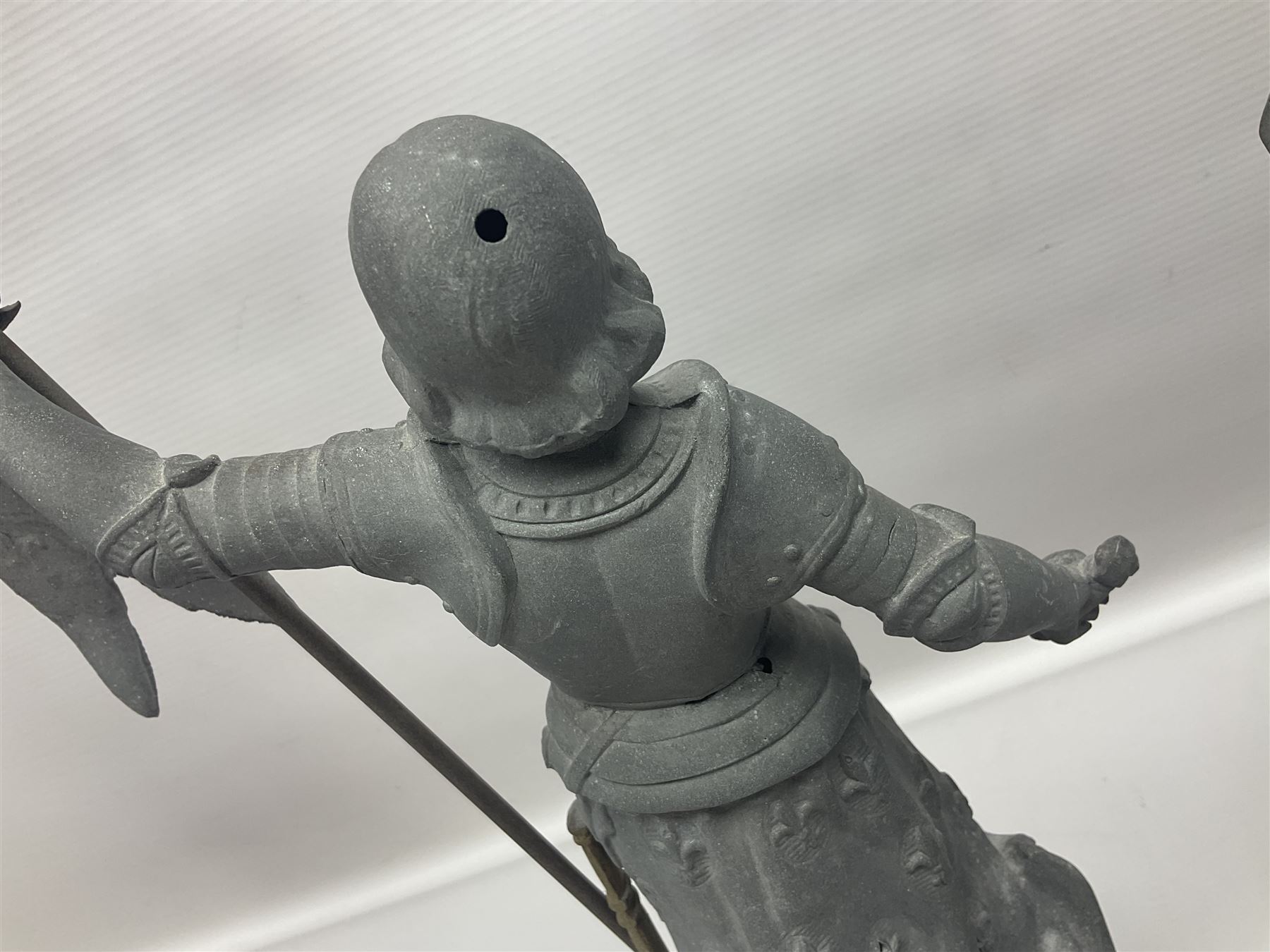 Pair of spelter figures modeled as Cavaliers, together with a spelter figure of Joan of Arc, largest H52cm