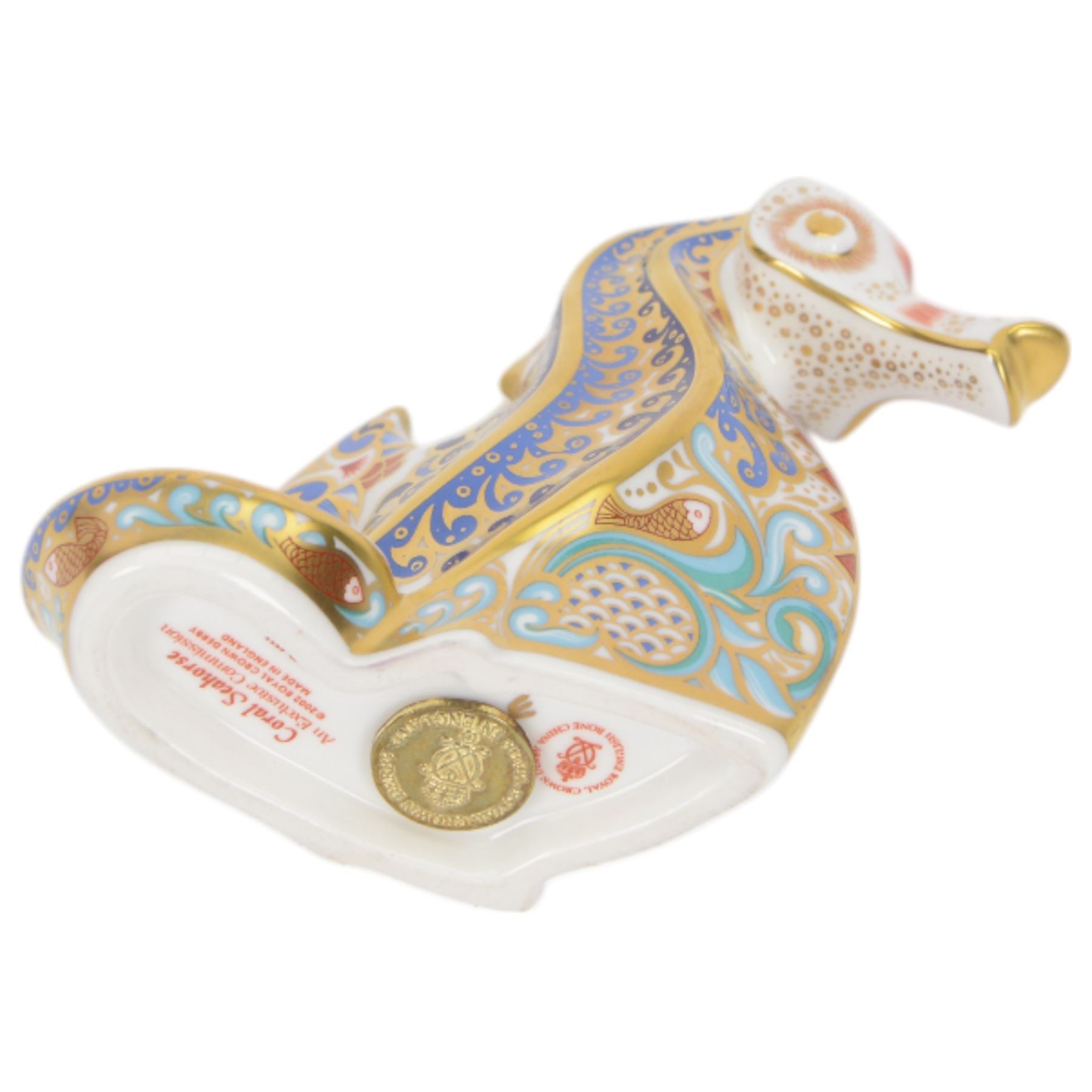 Three Royal Crown Derby paperweights, comprising Cromer Crab, Harbour Seal and Seahorse, all with gold stoppers and boxes