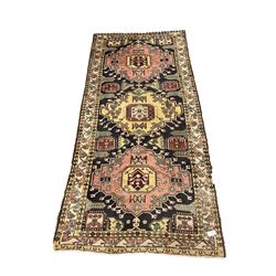 Turkish design blue and beige ground rug, triple medallion, repeating border