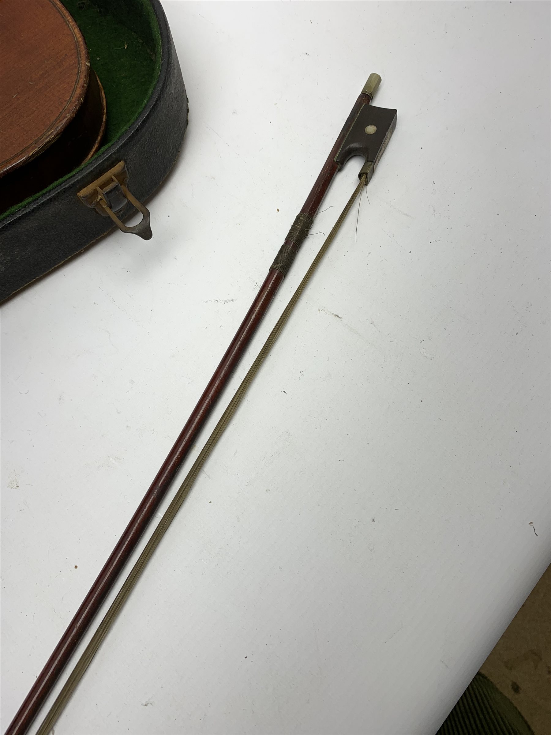 An early 20th century violin, The Maidstone, Murdoch & Co, London, with one piece maple back and spruce top, 60cm long, with bow, and ebonised coffin shaped case. 