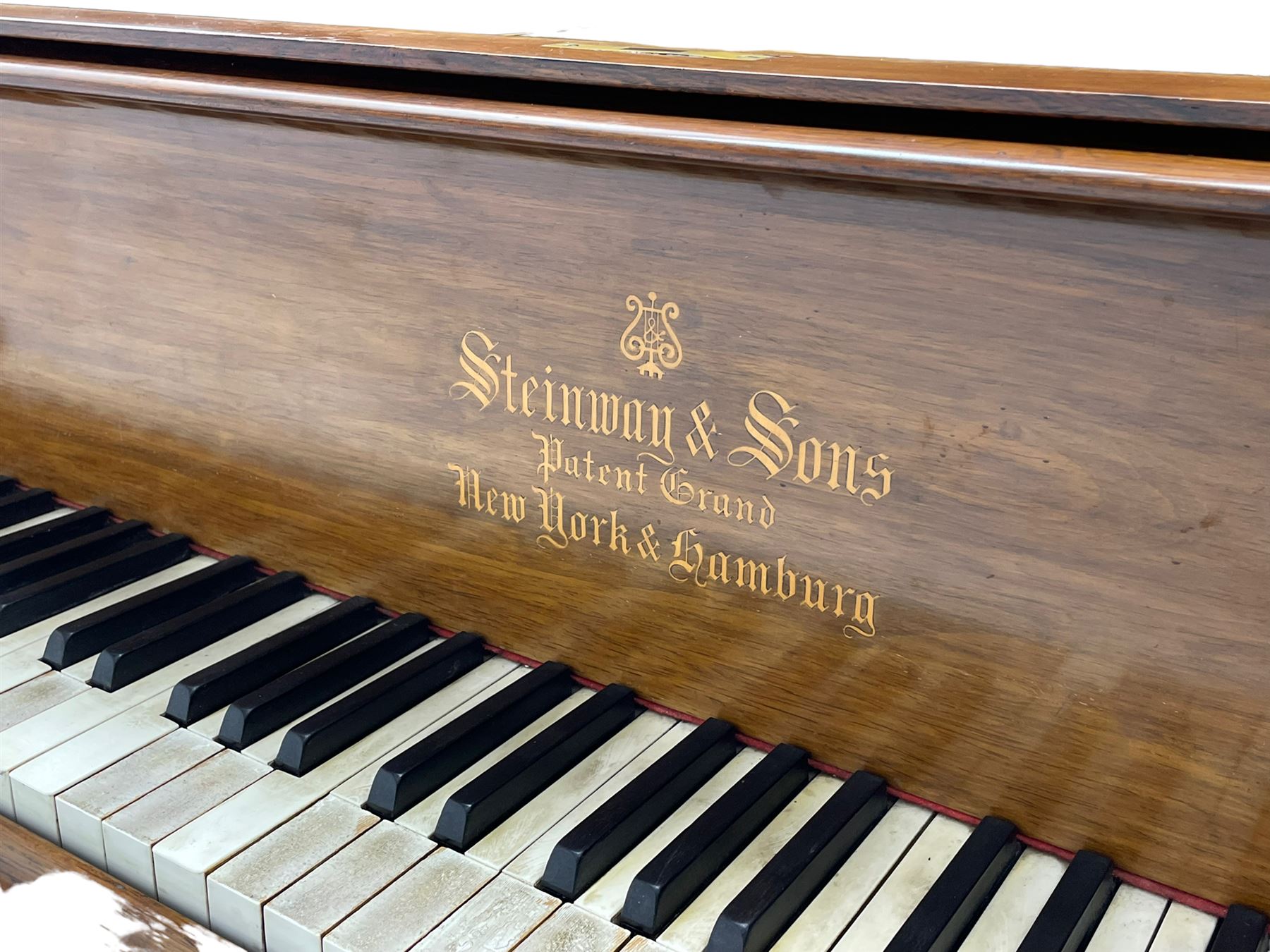 Steinway & Sons, Model A 188  grand piano - introduced in 1896, serial number 101814 (1901-1902) manufactured in Hamburg, with 20 overstrung bass notes, 85 ivory and ebony keys, in a  rosewood case with square tapered legs, roller repetition action with original stringing, felt, dampers and hammers, cast frame detailing numerous patents and awards 1859, 1872 and 1875, conforming lyre with sustaining and una corda pedals.

This item has been registered for sale under Section 10 of the APHA Ivory Act