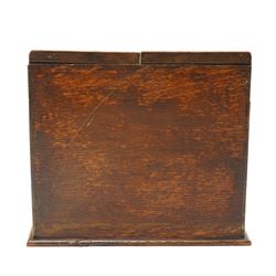 Victorian oak stationery cabinet, the two-door front opening to reveal compartmentalised interior, single drawer to base, H27cm W31cm 